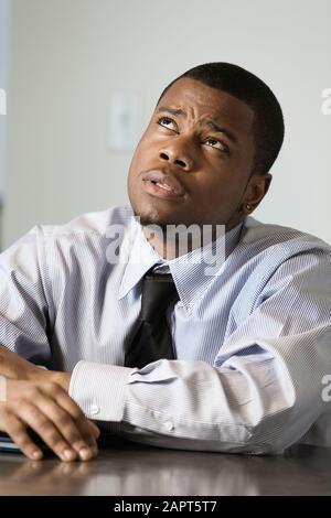 Close up of a contemplative business man. Stock Photo