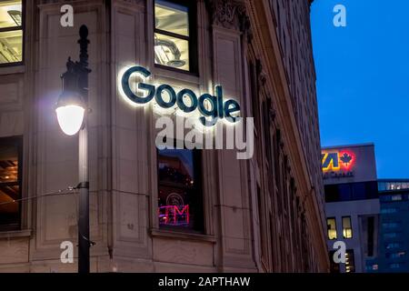 The Google Montreal office at 1253 McGill College Avenue, adjacent to Saint-Catherine Street West, is seen at night. Stock Photo