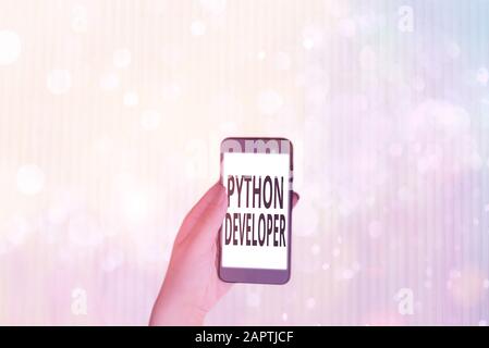 Text sign showing Python Developer. Business photo showcasing responsible for writing serverside web application logic Stock Photo