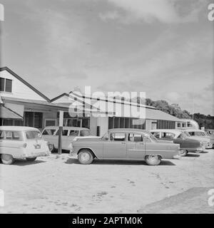 Netherlands Antilles and Suriname at the time of the royal visit of Queen Juliana and Prince Bernhard in 1955  The parking lot of Zanderij airport in Suriname Date: 1 October 1955 Location : Suriname Keywords: cars, airports Stock Photo