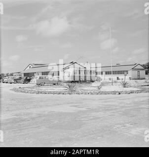 Netherlands Antilles and Suriname at the time of the royal visit of Queen Juliana and Prince Bernhard in 1955  The parking lot of Zanderij airport in Suriname Date: 1 October 1955 Location : Suriname Keywords: cars, buses, airports Stock Photo