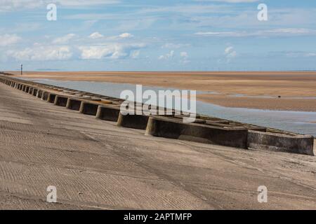 Concrete breakers on the beach Leasowe Wirral June 2019 Stock Photo