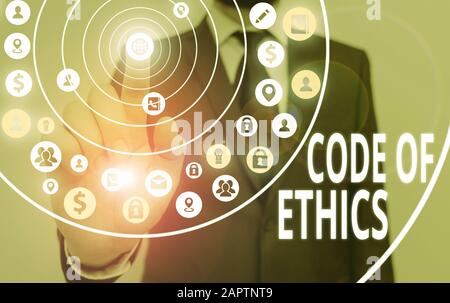 Writing note showing Code Of Ethics. Business concept for basic guide for professional conduct and imposes duties Stock Photo