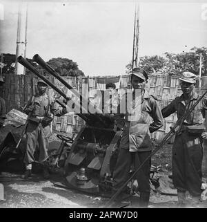 A-Division Surabaya [presentation of weapons and vehicles] Two KNIL ...