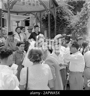 Israel 1948-1949: marriages at Lag BaoMer  Kisses and congratulations for a newlyweds, presumably in Haifa Annotation: Lag BaoMer (also Lag Baomer, Lag BaoMer, Lag B'Omer) is a day on traditional many marriages are concluded Date: 1948 Location: Haifa, Israel Keywords: weddings, happiness, marriages, kisses, religious holidays Stock Photo