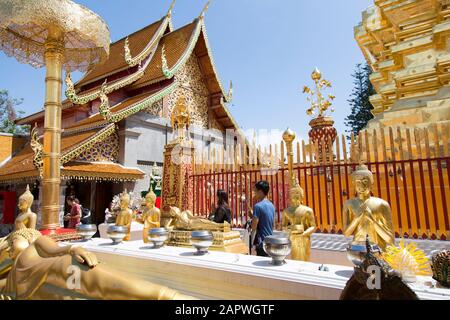 Thai people praying, with lotus flower, at Wat Doi Suthep Stock Photo