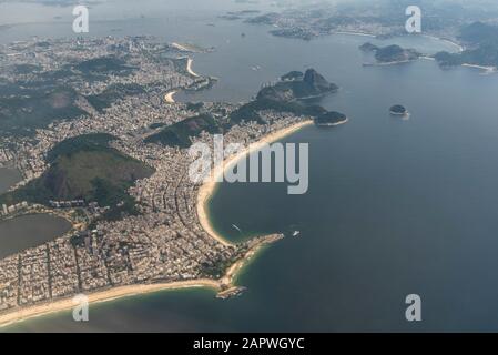 Beautiful aerial view to mountains, ocean and city in Rio de Janeiro, Brazil Stock Photo