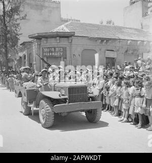 Israel 1948-1949: Jerusalem  Military vehicle carrying an automatic weapon during the military parade on May 15, 1949 in Jerusalem on the occasion of the first anniversary of Israel's independence Date: 23 Apr 1950 Location: Israel, Jerusalem Keywords: pharmacies, architecture, military parades, military vehicles, military, national holidays, public, billboards, uniforms, weapons Stock Photo