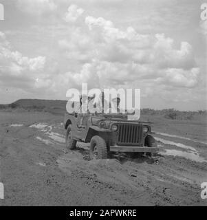 War volunteers in Malacca and Indonesia  Military in a jeep Date: 1946 Keywords: jeeps, military Stock Photo