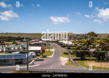 Stanley, Tasmania, Australia - December 15, 2009: Stanley Supermarket on corner at entrance to residential neighborhood under blue sky. Green gardens Stock Photo