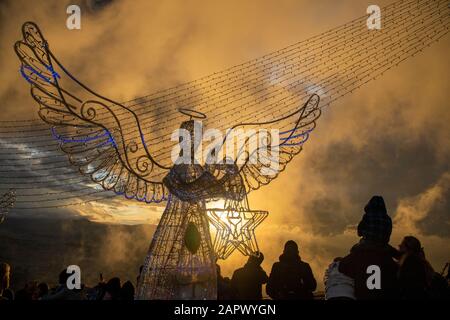 Looking down from Monserrate with views over the city of Bogota as the sun sets across the city on Christmas Day. Stock Photo