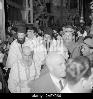 Middle East 1950-1955: Jerusalem  Easter celebration. Patriarch and priests in the Holy Sepulchre Church Annotation: At the time of the recording was Jerusalem in Jordan Date: 1950 Location: Palestine, Jerusalem, Jordan Keywords: churches, patriarchs, priests Stock Photo