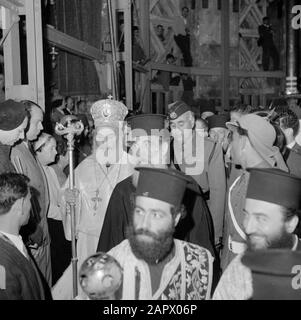 Middle East 1950-1955: Jerusalem  Easter celebration. Patriarch and priests in the Holy Sepulchre Church Annotation: At the time of the recording was Jerusalem in Jordan Date: 1950 Location: Palestine, Jerusalem, Jordan Keywords: churches, patriarchs, priests Stock Photo