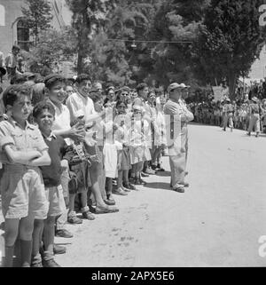 Israel 1948-1949: Jerusalem  Audience at the military parade on May 15, 1949 in Jerusalem on the occasion of the first anniversary of Israel's independence Date: 23 Apr 1950 Location: Israel, Jerusalem Keywords: children, military parades, national holidays, public, uniforms Stock Photo