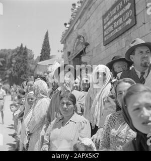 Israel 1948-1949: Jerusalem  Audience including Bucharin women, at the military parade on May 15, 1949 in Jerusalem on the occasion of the first anniversary of Israel's independence Date: 23 Apr 1950 Location: Israel, Jerusalem Keywords: military parades, national holidays, public, billboards Stock Photo