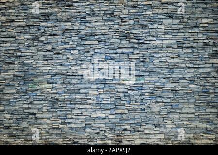 Abstract Irregular Ocean Blue Color Brick Wall Patterns as Background or Textures Stock Photo