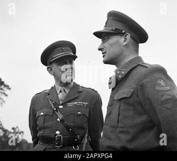 Prince Bernhard visits Dutch troops at their army base in Great Britain during World War II  Two officers in conversation Date: 1940 Location: Great Britain Keywords: royal home, military Stock Photo