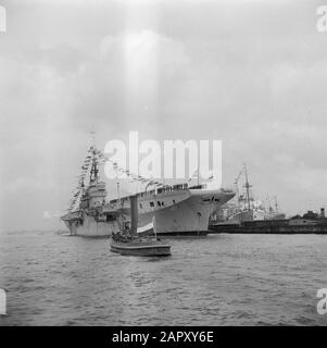 Fifty year government anniversary of Queen Wilhelmina  Friday afternoon. The aircraft carrier Karel Doorman belonged to the Navy units that participated in the National Fleet Schouw on the Binnen-IJ in Amsterdam, taken by the Royal Family on board the yacht Piet Hein Date: September 3, 1948 Location: Amsterdam, Noord-Holland Keywords: royal visits, navy, fleetschouwen Stock Photo