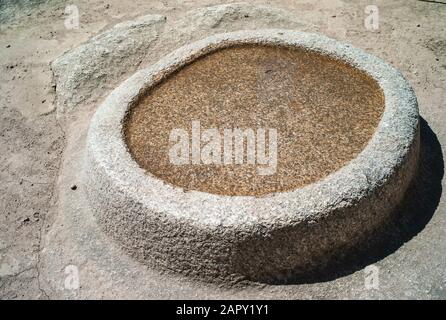 Inka Water Mirror Sculpture in the Sun Temple of Machu Picchu, Peru. Ancient Astronomy Mirror for Observing the Sky. Stock Photo