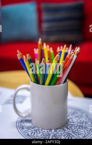 Coloring exercise with multi-colored pencils Stock Photo