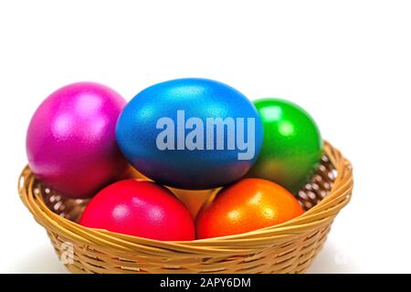 Colorful easter eggs in the basket Stock Photo