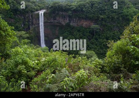 Cascade Chamarel or Chamarel Waterfall in  the Black River Gorges National Park on Mauritius plunging 80-100 metres through forest and cliffs Stock Photo