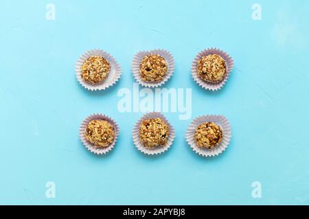 Healthy vegetarian raw bites energy balls made of dried fruits and nuts and seeds
