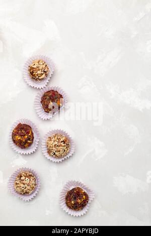 Date energy balls on neutral background Stock Photo