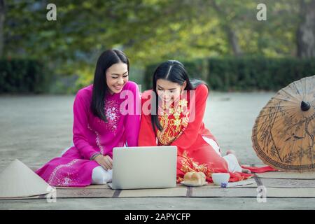 Asian student woman, Ao dai is famous traditional costume for woman in Vietnam Stock Photo