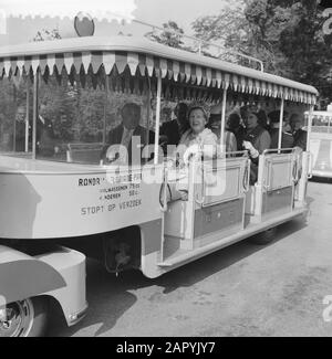 Floriade 1960  Queen Juliana is driven in a small train over the terrain Date: 20 July 1960 Location: Rotterdam, Zuid-Holland Keywords: queens Personal name: Juliana, Queen Institution name: Floriade Stock Photo