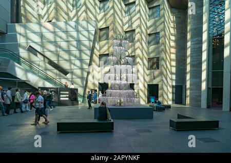 Melbourne, Australia - April 18, 2017: National Gallery of Victoria Federation Court interior with people Stock Photo