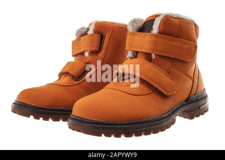 Waterproof kids winter shoes isolated on white background. Yellow boots. Stock Photo