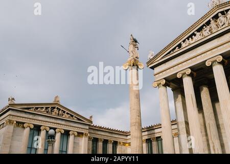 Athens, Greece - Dec 21, 2019: Athena column at The Academy of Athens on Panepistimiou street in Athens, Greece Stock Photo