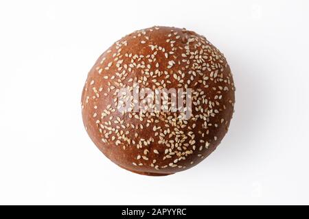 Homemade sourdough bread. Burger bun isolated on white background. Stock Photo