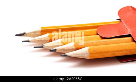 Five pencils on white background, macro photo Stock Photo