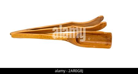 A set of wooden appliances for traditional Chinese tea drinking. Close up. Isolate on a white background Stock Photo