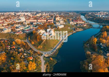 Grodno, Belarus. Aerial Bird's-eye View Of Hrodna Cityscape Skyline. Famous Popular Historic Landmarks In Sunny Autumn Evening. Stock Photo