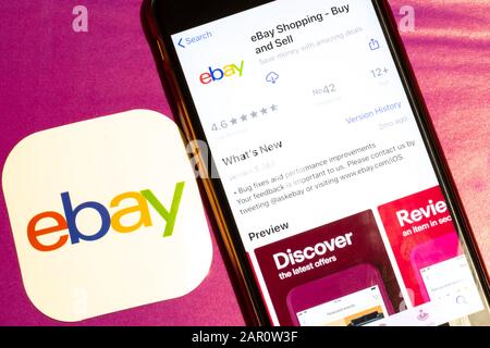 Los Angeles, California, USA - 22 January 2020: Ebay app logo and phone with icon close up on purple background, Illustrative Editorial Stock Photo