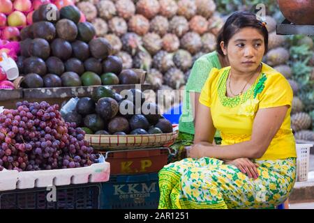 Fruit vendor at Thiri Mingalar Vegetable and Fruit whole sale market at Yangon, Myanmar (Burma), Asia in February Stock Photo