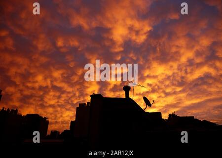 sunset reflecting off stratocumulus cloud deck over the city of Santiago Chile Stock Photo