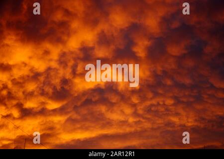 sunset reflecting off stratocumulus cloud deck over the city of Santiago Chile Stock Photo