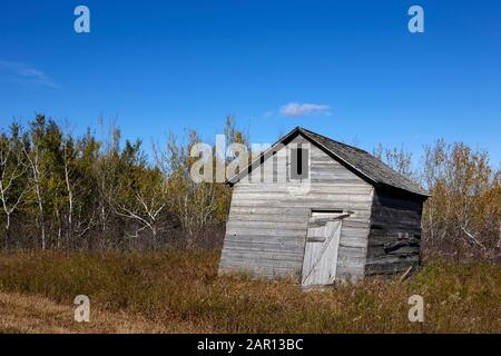 old wooden falling down storage barn in saskatchewan Stock Photo