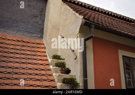A detail of roofs with steps and plants (Prague, Czech Republic, Europe) Stock Photo