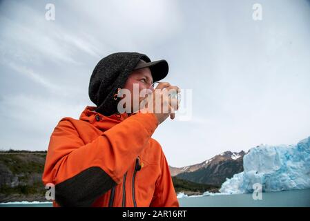 Drinking Whiskey with glacier ice at The Perito Moreno Glacier, El Calafate, Argentina Stock Photo