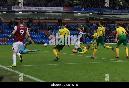 Turf Moor, Burnley, Lanchashire, UK. 25th January 2020; Turf Moor, Burnley, Lanchashire, England; English FA Cup Football, Burnley versus Norwich City; Ralf Fahrmann of Norwich City saves the shot of Jay Rodriguez of Burnley - Strictly Editorial Use Only. No use with unauthorized audio, video, data, fixture lists, club/league logos or 'live' services. Online in-match use limited to 120 images, no video emulation. No use in betting, games or single club/league/player publications Stock Photo
