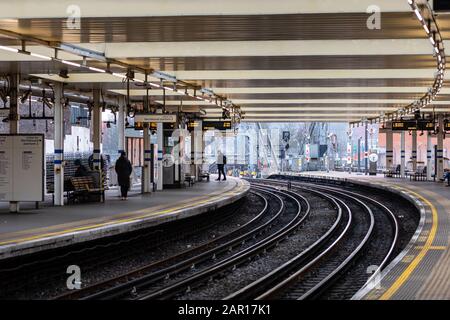 London, UK - January 1, 2020: Railroad tracks and platforms at Finchley Road Underground Station Stock Photo