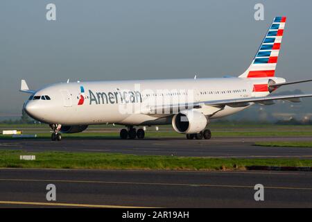 Paris / France - April 24, 2015: American Airlines Airbus A330-300 N276AY passenger plane arrival and landing at Paris Charles de Gaulle Airport Stock Photo