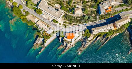 Rocky bay in Italy. Aerial drone view on Adriatic sea beach, Camogli, liguria. Stock Photo