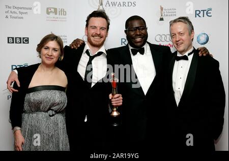 DUBLIN, IRELAND - FEBRUARY 14: Laura Hastings Smith, Michael Fassbender, Steve McQueen and Robin Gutch with their Irish Film and Television best film award for Hunger attends the press room at the 6th Annual Irish Film and Television Awards at the Burlington Hotel on February 14, 2009 in Dublin, Ireland. Stock Photo