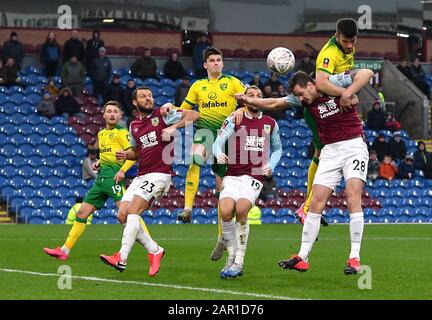Norwich City's Grant Hanley (right) scores his side's first goal of the game during the FA Cup fourth round match at Turf Moor, Burnley. Stock Photo